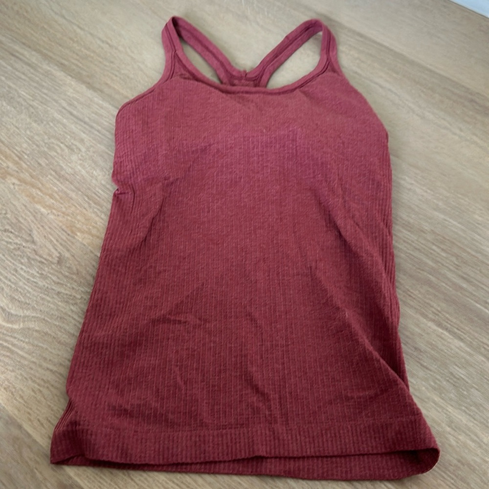 No tag - fits like a small!